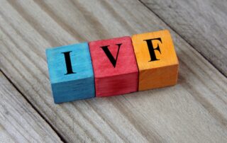 IVF (In Vitro Fertilization) acronym on colorful wooden cubes